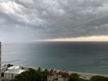 Ominous storm clouds threaten Boca Raton beach.