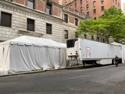 Refridgerator trucks outside of Lenox Hill Hospital filled with more dead bodies than the morgue could handle.