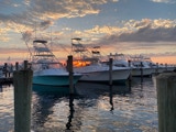 Sunset over yachts, Quogue, Long Island, New York.